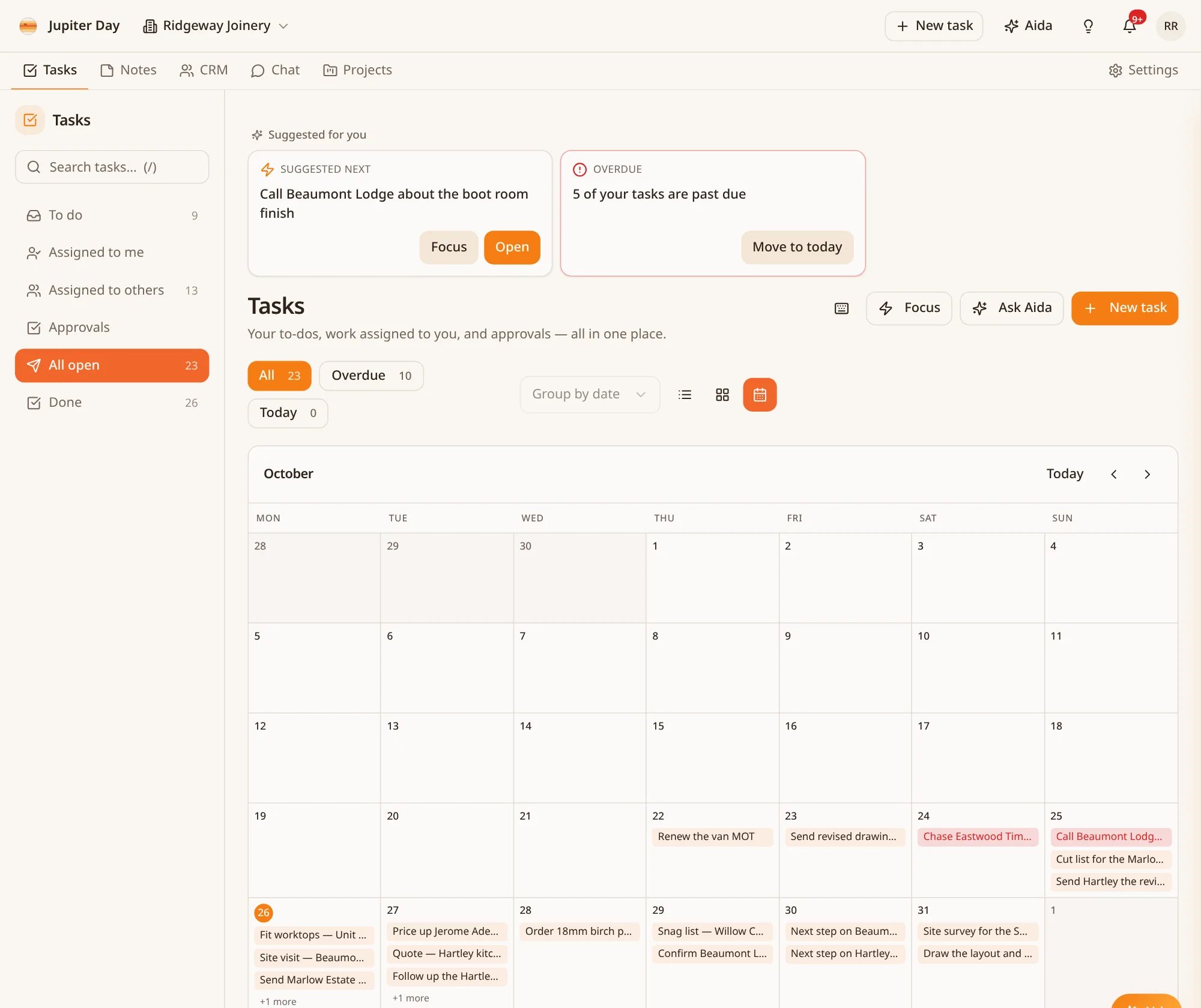 Tasks calendar month view for October with tasks on their due days.